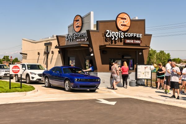 image of a Ziggis drive through location with people walking up to the window